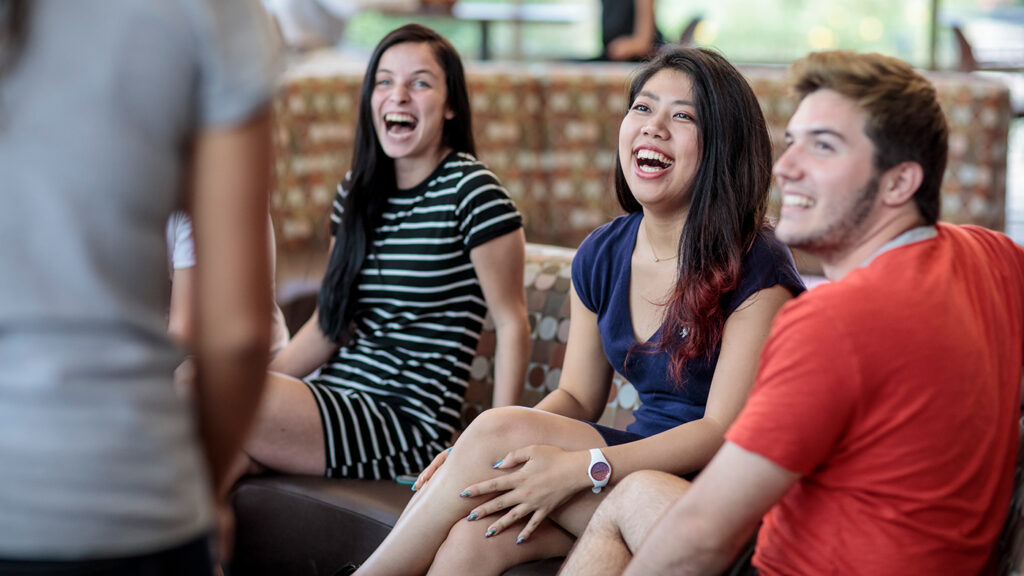 Visit Missouri Valley University Students laughing together during orientation