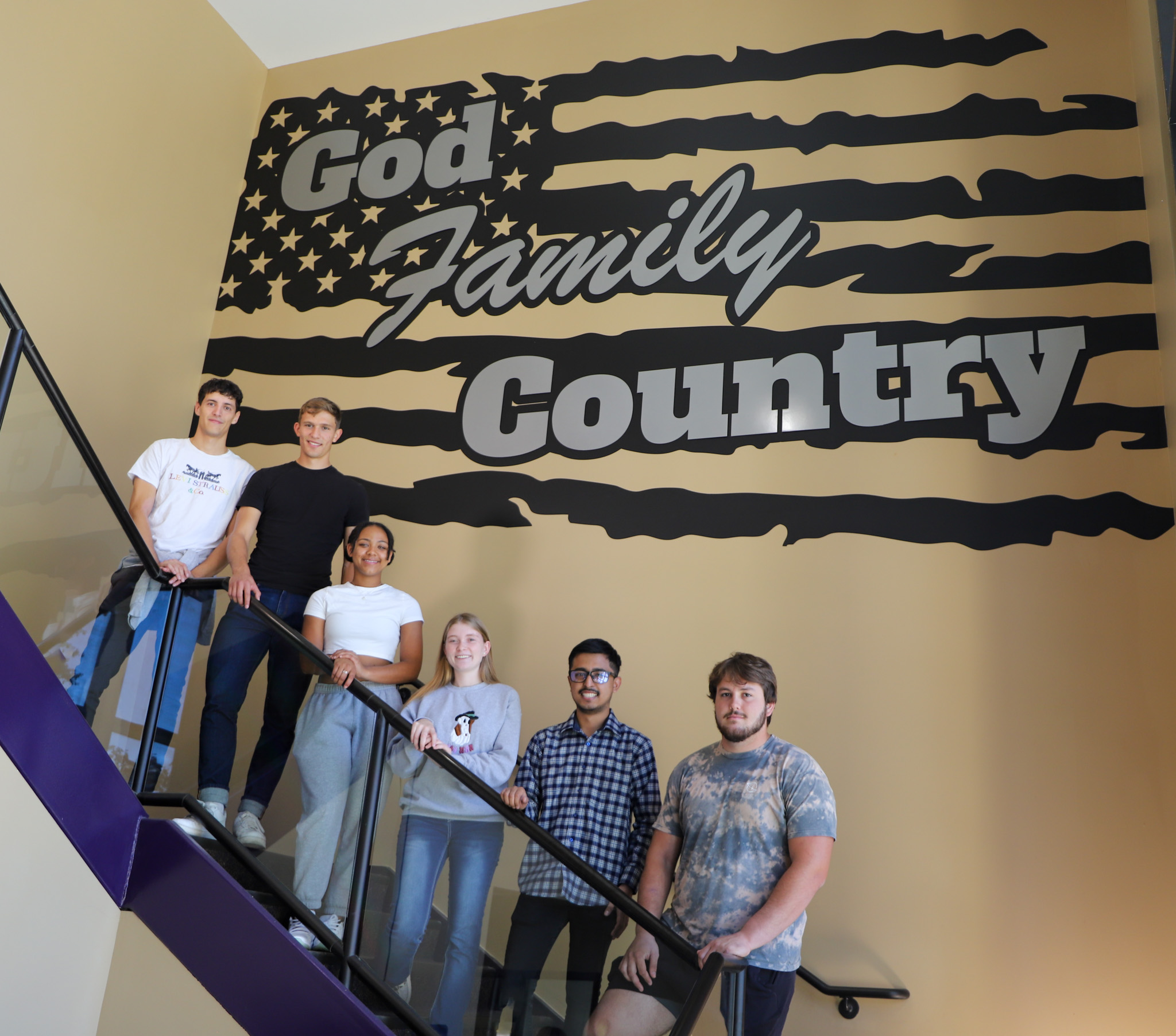 God-Family-Country American flag hanging in a Missouri Valley University stairway