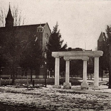 Murrell Library & Academic Support Center Archival photo of stone columns standing in front of a steepled campus building in winter.